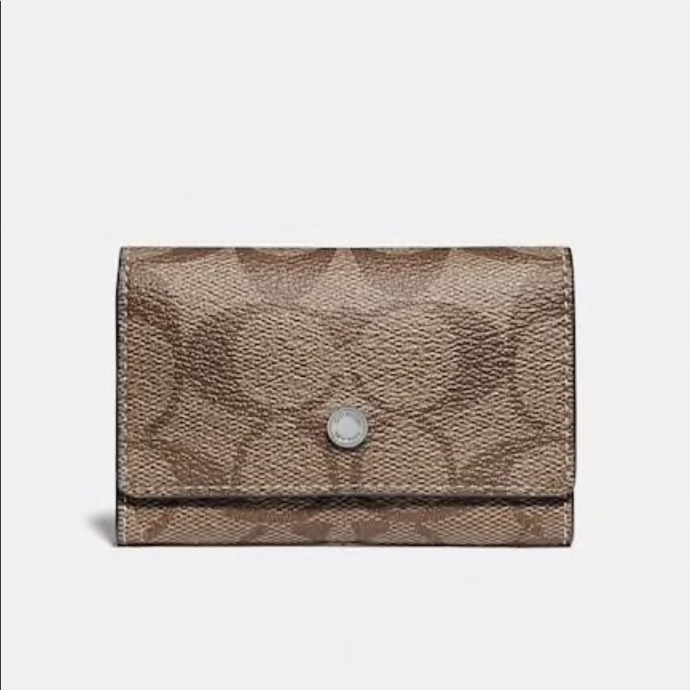 Coach 5-key case in signature canvas.  Brand new!